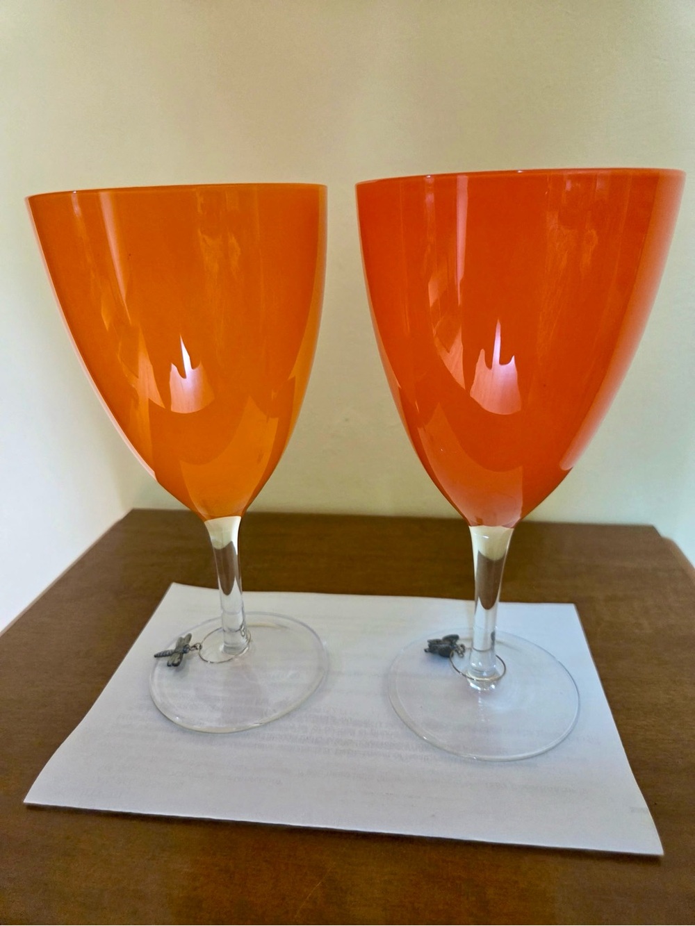 Set of Two Orange Handblown Glass With Clear Glass Stem Wine Glasses